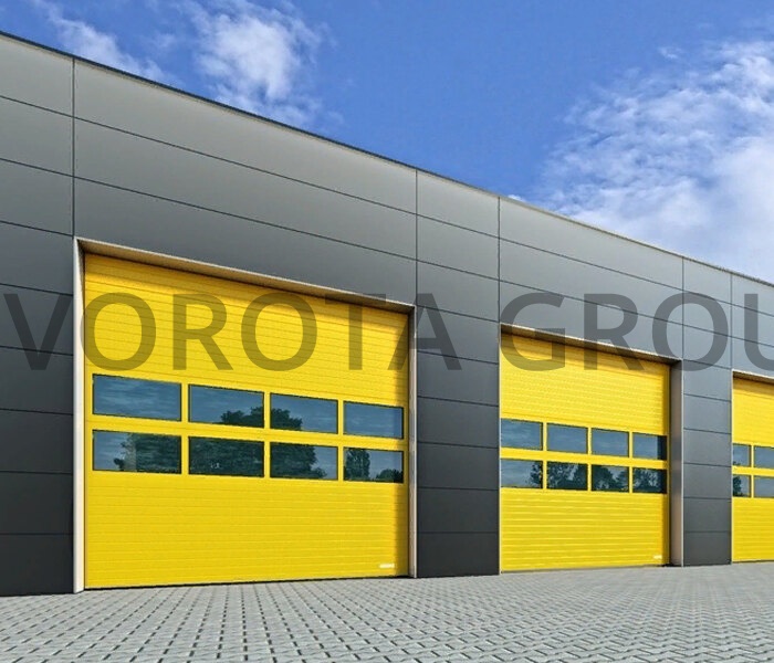 Промышленные гаражные ворота желтого цвета с окнами 2000x2500